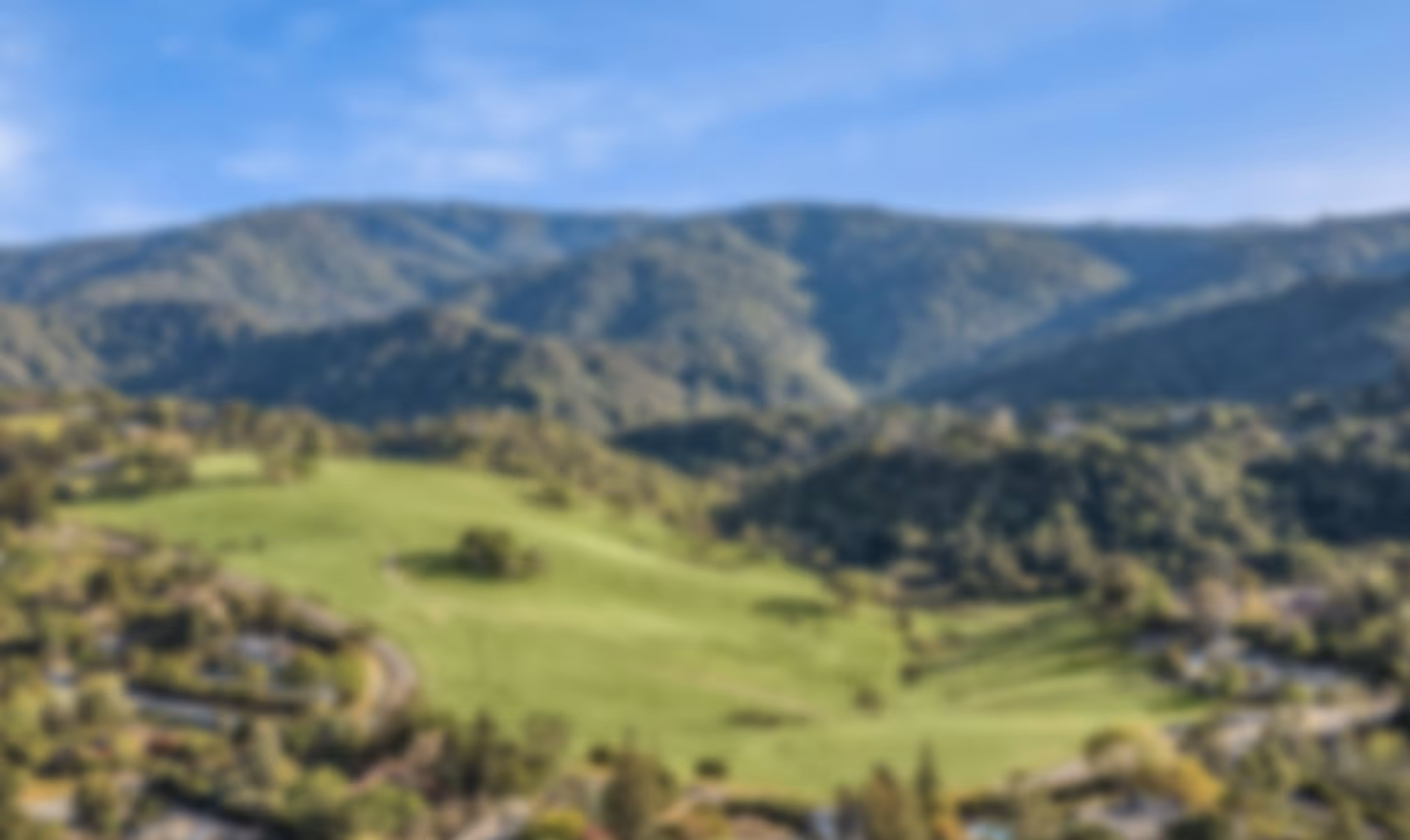 Aerial view of Los Altos Hills and the surrounding green hills